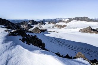 Snow on the Wilder Freiger mountain peak, picturesque high mountain landscape, view of