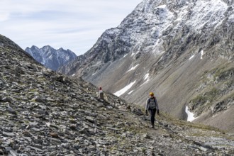 Mountaineer on a rocky hiking trail, ascent to the summit of Böses Weibl, Wiener Höhenweg, Schober