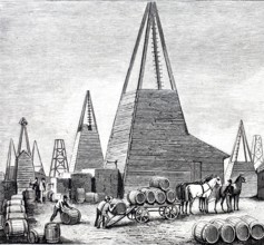Petroleum wells in Oelheim, Ölheim, oil production, drilling tower with basins in front of it to