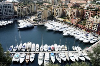 Port Hercule harbour, with numerous yachts and buildings of the city, Monaco