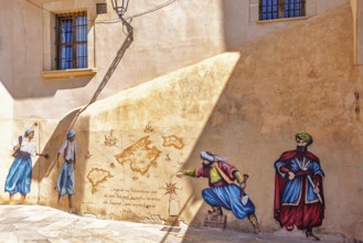 Mural street art paintings on a wall in the old town, Palma de Mallorca, Mallorca, Spain