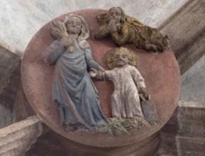 Mary dragging the infant Jesus into the school, keystone in the altar vault of the Church of Our