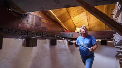 Man inside the windmill holding a long staff, Windmill, Antimacheia, Kos, Dodecanese, Greek