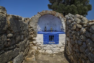 Ancient stone chapel in a peaceful, natural setting with clear blue skies, Artemis Temple, Artemis,