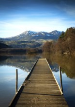 Lake Chambon in autumn, Massif of Sancy in the background, Regional Nature Park of the Volcanoes of