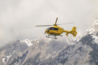 Rescue helicopter, emergency helicopter in flight, Schwaz, Tyrol, Austria