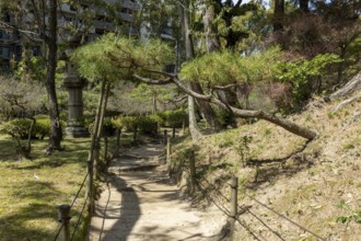 Path in Shukkei-en, historical Japanese strolling garden, Japanese garden, green area, tourist