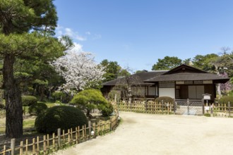 Seifukan teahouse in Shukkei-en, historical Japanese strolling garden, Japanese garden, green area,