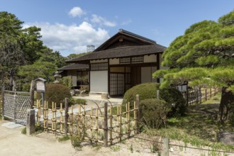 Seifukan teahouse in Shukkei-en, historical Japanese strolling garden, Japanese garden, green area,