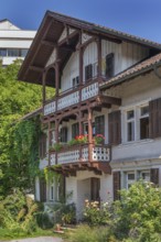 Old villa with wooden shingle façade, large balcony with floral decorations, around 1900, Dornbirn,