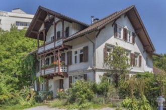 Old villa with wooden shingle façade, large balcony with floral decorations, around 1900, Dornbirn,