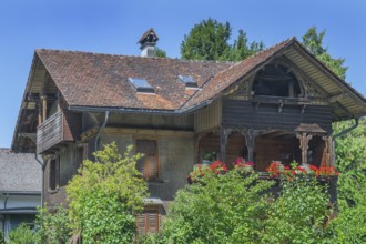 Old villa with wooden shingle façade, large balcony with floral decorations, around 1900, Dornbirn,