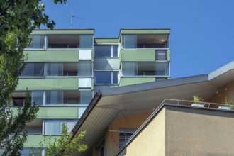 Blue sky, modern green facades with balconies, Dornbirn, Vorarlberg, Austria