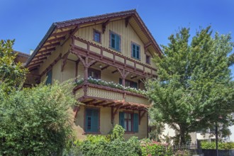 Ochre yellow wooden barrel, Villa Auf der Flur with large balcony around 1900, Dornbirn,