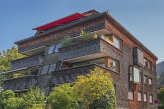 Modern house with wooden shingle façade, large green balcony, Dornbirn, Vorarlberg, Austria