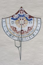 Sundial with the saying, time hurries-divides-and heals, Church of the Assumption of the Virgin