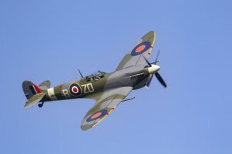 Supermarine Spitfire warbird military aircraft in Royal air force RAF colours flying, England,