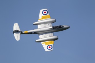 Gloster Meteor military jet aircraft in Royal air force RAF colours flying, England, United Kingdom