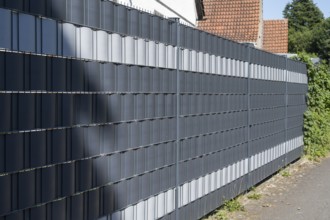 Double picket fence with privacy strips, North Rhine-Westphalia, Germany