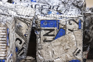 Cubes made from scrap metal, disused car licence plates. Symbolic photo. Stuttgart,