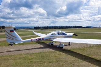 Motorised glider taxiing to the runway at Wasserkuppe airfield, Rhön, Gersfeld, Fulda district,