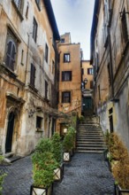 Narrow deserted alley in the centre of Rome, Rome, Lazio, Italy