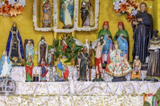 Images of saints and entities present on an Afro-Brazilian altar in Congado in Minas Gerais, Belo