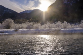 Sunrise in the forest on the young Isar in winter between Wallgau and Vorderriss, Tölzer Land,