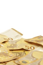 Scattered fifty euro banknotes forming a corner frame on a white background, ideal for finance and