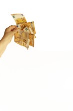 Hand holding euro banknotes against a white background, symbolizing wealth, savings, or expenses