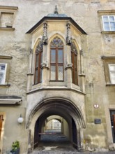 Gothic bay window above an archway on an old stone wall Göglhaus Krems Wachau Waldviertel Lower