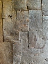 Textured rusty metal panels with rivets forming an industrial surface Riegersburgs Styria Austria