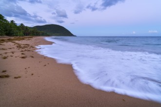 Grande Anse beach, coast and sea at dawn, Deshaies, Basse Terre, Guadeloupe, French Antilles,