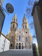High Gothic church towers rise symmetrically into the clear blue sky, Klosterneuburg Lower Austria