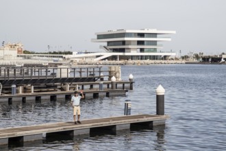 Modern architecture on the harbour with jetty and calm water