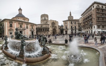 Historic fountain in front of the Virgen de los Desamparados Naval Museum Fuente del Turia fountain