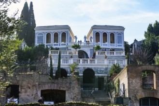 View from Forum Romanum to building Uccellerie Farnesane at the edge of Roman Palatine Hill