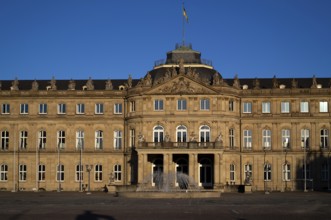 Fountain, main wing and cour d'honneur New Palace in the evening light, Stuttgart,