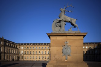 Heraldic animal stag in front of the main wing and cour d'honneur Neues Schloss, Schlossplatz,