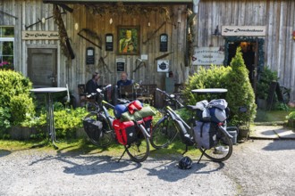 Two e-bikes, visitors in front of a country inn, Rischenau, LÃ¼gde, Weserbergland, North