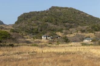 Residential houses in a rural mountain landscape in the evening light, Hota, Kyonan, Chiba