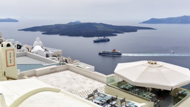 View from the island's capital Fira to the uninhabited volcanic island of Nea Kameni in the