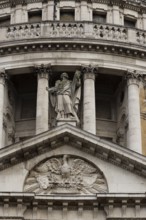 St. Pauls cathedral close up of figures on the outside of the building, City of London, England,