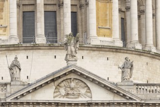St. Pauls cathedral close up of figures on the outside of the building, City of London, England,