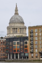 Dome of St. Pauls cathedral overlooking the river Thames, City of London, England, United Kingdom