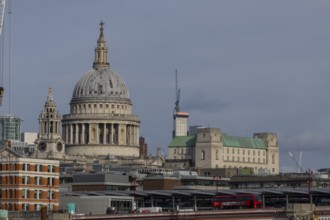Dome of St. Pauls cathedral and mechanical cranes, City of London, England, United Kingdom