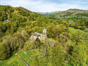 Holy Trinity Church from a drone, Bog Lane, Brathay village, Lake District, Cumbria, England,