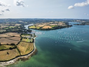 Mylor Churchtown Village from a drone, Carrick Roads, River Fal, Falmouth, Cornwall, UK