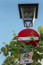 Street lamp and traffic sign, no entry, free for bicycles, Isny, Swabia, Baden-WÃ¼rttemberg,