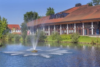 Spa hotel am Park and Oberer Grabenweiher with fountain, Isny, Swabia, Baden-WÃ¼rttemberg, Germany